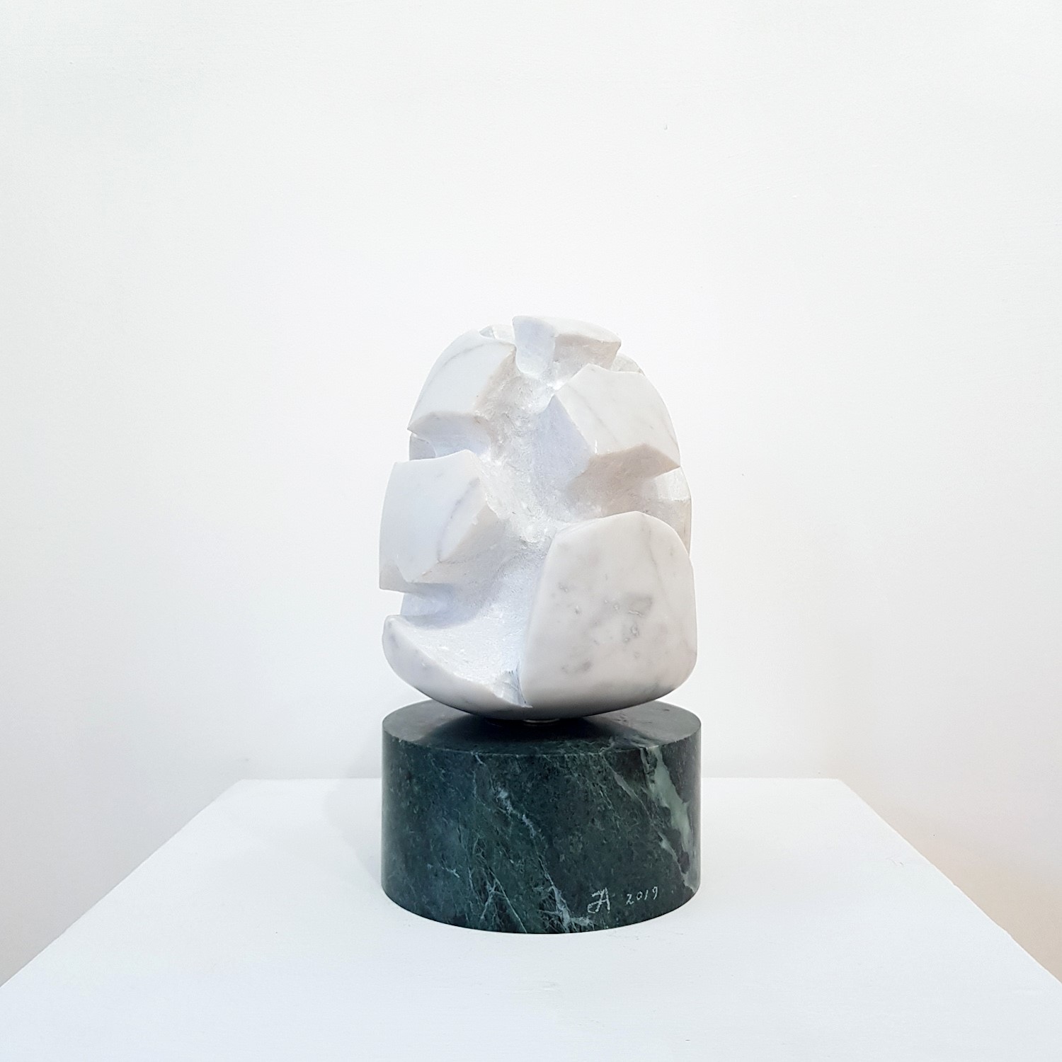 'Opening Pinecone | Carrara Marble' by artist Tom Allan